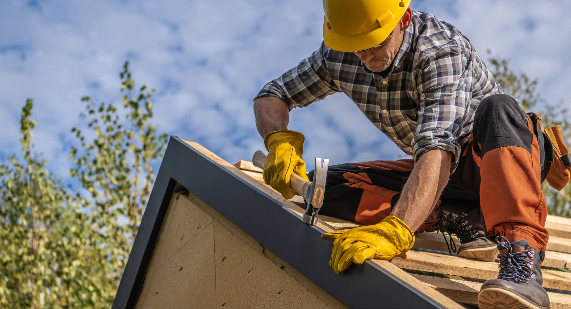 Roofing contractors installing roof
